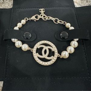 Authentic Chanel logo faux pearl bracelet